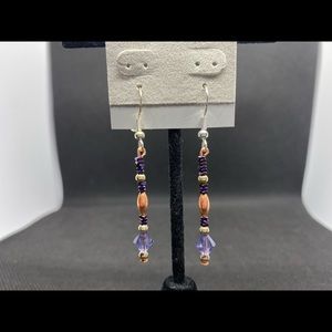 Purple Swarovski Crystals Earrings with silver beads and copper beads.
